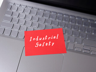 Wall Mural - Business concept about Industrial Safety with phrase on the piece of paper.