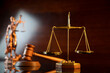 © zolnierek - Law and justice concept. Law symbols composition: judge’s gavel, Themis  statue and scale.