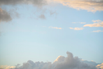 Wall Mural - clouds in the sky as a frame, sunset texture background.