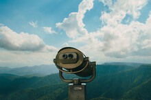 Coin Operator Binocular Viewer Landscape With A Beautiful Cloudy Sky And Mountains ..