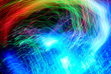 Wall Mural - Abstract motion curved lights on dark background