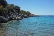 Rocky coastline beach in Croatian island Pag with blue sea.