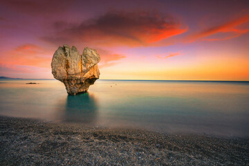 Wall Mural - Lonely rock sculpture at the shape of heart, Preveli, Crete, Greece