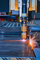 Sticker - A vertical shot of the modern laser cutter in the factory