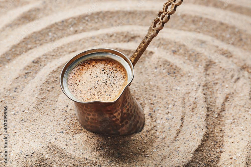 Turkish coffee cooked in sand, closeup