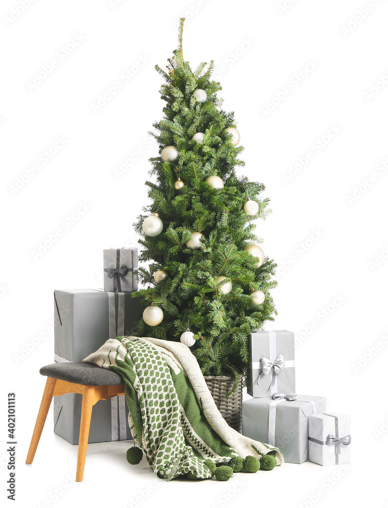 Beautiful decorated Christmas tree with gift boxes on white background