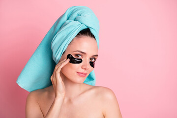 Wall Mural - Photo of young lovely happy positive naked girl apply cream wear teal turban and eye patch isolated on pink color background