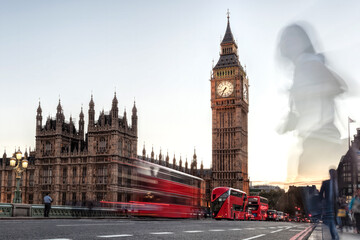 Fototapete - Big Ben with red buses on the bridge in the evening, London, England, United Kingdom
