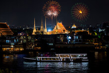 Top View Of Chao Phraya River Cruise Boat With Wat Pho Reclining Buddha And Golden Mount In New Year Firework Festival Performance.