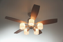 Modern Ceiling Fan With Lamps Indoors. Interior Element