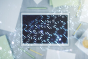 Poster - Creative concept of wireless technology with hexagon hologram and modern digital tablet on background, top view. Big data and database concept. Multiexposure