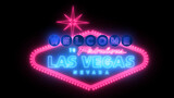 Fototapeta Zachód słońca - Las Vegas sign over black background