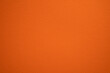 Orange color wall texture background. Carrot color texture backdrop design. Amber, pumpkin, halloween backdrop