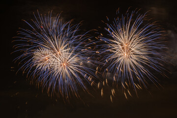 Blue, White and Gold Fireworks Bursting