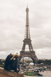 © Alexandra Phillips - Woman in front of Eiffel Tower