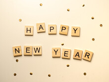 Happy New Year - Napis Z Drewnianych Kostek, Confetti, Białe Tło, Flatlay  