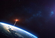 Rocket Launch From The Earth Planet Through The Clouds With A Bright Glow Of The Engine On The Orbit And A Bright Blue Nebula Galaxy. Elements Of This Image Furnished By NASA