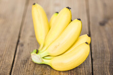 Ripe Banana Tropical Fruit On Wooden Background, Fresh Banana.