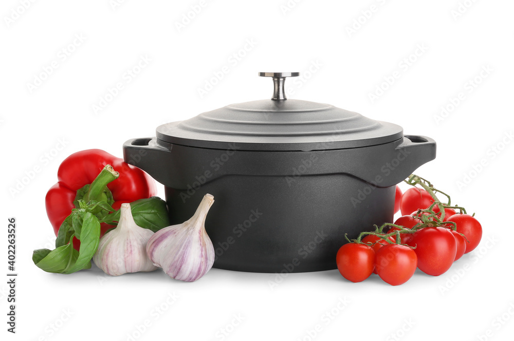 Cooking pot with vegetables isolated on white background