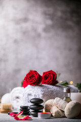 Wall Mural - Wellness decoration, spa massage setting,  oil on stone background. Valentine's Day Zen and relax concept.