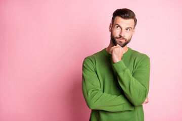 Wall Mural - Photo portrait of curious thoughtful man looking empty space got idea isolated pastel pink color background