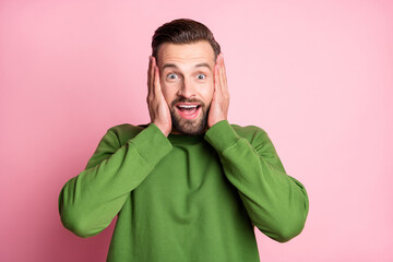 Poster - Close-up portrait of attractive cheerful amazed guy good news reaction isolated over pink pastel color background