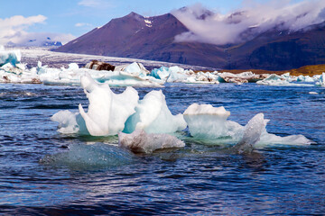 Wall Mural - Cold July day. The lagoon Jokulsaurloun