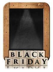 Aufkleber - Text Black Friday made of wooden blocks in front of an empty blackboard with copy space. Isolated on white background with reflections.