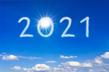 Better New Year Concept. 2021 Text On Blue Sky During A Sunny Day, Signifying A Brighter And Better Future.