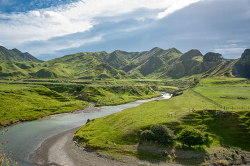 Poster - River winding through hilly Wairarapa farmland