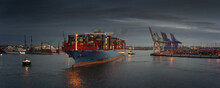 Large Container Ship At A Terminal In The Early Evening 