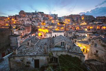 Beautiful view of the famous ancient stone city of Matera at dusk, Basilicata, Italy, Europe.