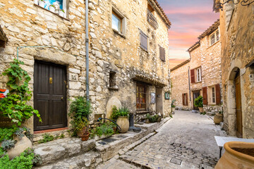 Wall Mural - A charming, picturesque back street in the medieval walled village of Tourrettes-Sur-Loup in the Alpes-Maritimes area of Southern France.