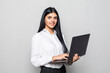 © F8  \ Suport Ukraine - Successful business woman is standing with laptop on white background.
