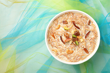 Wall Mural - Khir or kheer payasam also known as Sheer Khurma Seviyan consumed especially on Eid or any other festival in india/asia. Served with dry fruits toppings in a ceramic bowl
