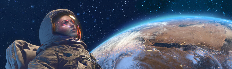 Wall Mural - a female astrounaut in outer space against the earth planet on background
