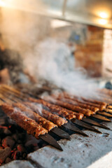 Wall Mural - Traditional Turkish grilled shish kebab or kebap. Delicious Adana kebab in Turkish Restaurant