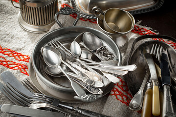 Wall Mural - Silver dishes on old background