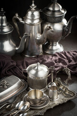 Wall Mural - Silver dishes on old background