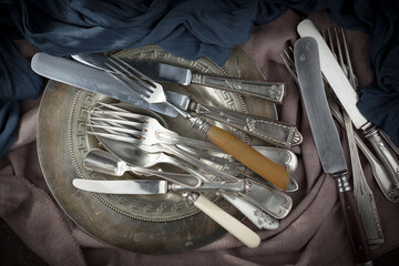 Wall Mural - Silver dishes on old background