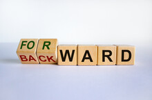 Forward Or Backward Symbol. Turned Cubes And Changed The Word 'backward' To 'forward' On Wooden Cubes. Beautiful White Background, Copy Space. Business And Forward Or Backward Concept.