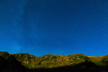 Wall Mural - mountain landscape at night with many stars