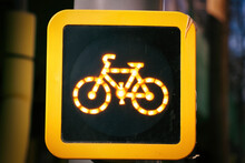 
bicycle traffic light with yellow color