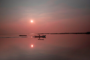 Wall Mural - Inspirational calm sea with sunset sky. The sea and sky are the same color.