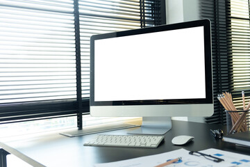 Workspace with desktop computer, office supplies,  at home or studio. Blank screen for graphics display montage.