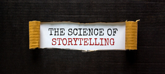 Wall Mural - The science of storytelling symbol. The words 'the science of storytelling' appearing behind torn black paper. Beautiful background. Business and the science of storytelling concept.