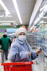 Poster - Senior woman wearing face mask  shopping  in  supermarket