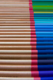 Fototapeta Tęcza - Background from wooden pencils.Set from wooden pencils.The artist’s drawing tool. Multi-colored pencils. Pencil point.