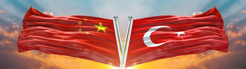 Wall Mural - Double Flag Turkey vs China flag waving flag with texture sky clouds and sunset background	