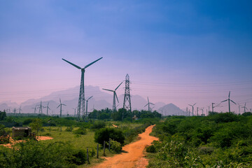 beautiful view of windmills or wind turbines farm in nagercoil, south india. with a colorful sky and